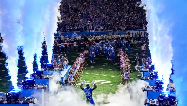 DETROIT, MICHIGAN - NOVEMBER 17: Za'Darius Smith #99 of the Detroit Lions is introduced before a game against the Jacksonville Jaguars at Ford Field on November 17, 2024 in Detroit, Michigan.   Nic Antaya/Getty Images/AFP (Photo by Nic Antaya / GETTY IMAGES NORTH AMERICA / Getty Images via AFP)