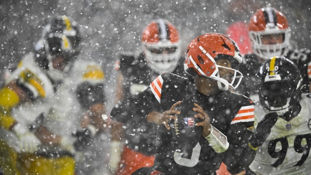 Cleveland Browns quarterback Jameis Winston (5) scrambles in the second half of an NFL football game against the Pittsburgh Steelers, Thursday, Nov. 21, 2024, in Cleveland. (AP Photo/David Richard)