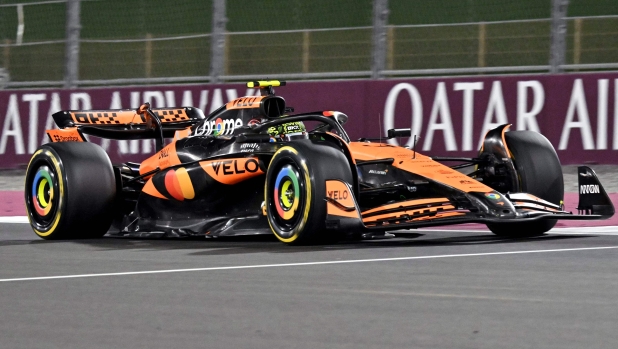 McLaren's British driver Lando Norris drives during the Qatari Formula One Grand Prix at the Lusail International Circuit in Lusail, north of Doha, on December 1, 2024. (Photo by Andrej ISAKOVIC / AFP)