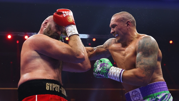 RIYADH, SAUDI ARABIA - DECEMBER 21: Oleksandr Usyk punches Tyson Fury during the IBF, IBO, WBA, WBC and WBO Undisputed World Heavyweight titles' fight between Oleksandr Usyk and Tyson Fury as part of Oleksandr Usyk v Tyson Fury 2, Reignited card at Kingdom Arena on December 21, 2024 in Riyadh, Saudi Arabia. (Photo by Richard Pelham/Getty Images)