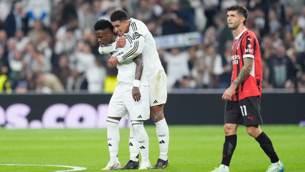 Vinicius Junior of Real Madrid celebrates a goal 1-1 with Jude Bellingham during the UEFA Champions League, League phase, Matchday 4 football match between Real Madrid CF and AC Milan on 5 November 2024 at Santiago Bernabeu stadium in Madrid, Spain - Photo Oscar J Barroso / Spain DPPI / DPPI (Photo by Oscar Barroso / Spain DPPI / DPPI via AFP)