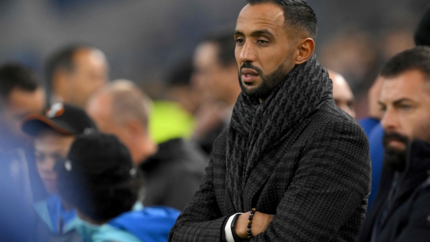 (FILES) Marseille's Morrocan sports consultant Medhi Benatia looks  on during   warm up prior to the UEFA Europa League Group B football match between Olympique de Marseille and Ajax Amsterdam at the Velodrome Stadium in Marseille, southeastern France, on November 30, 2023. Olympique de Marseille sporting director Mehdi Benatia was scathing in his criticism of referee Benoit Bastien after the 3-2 win at Lyon, blaming him in particular for the early dismissal of Leonardo Balerdi on Matchday 5 of Ligue 1. (Photo by Nicolas TUCAT / AFP)