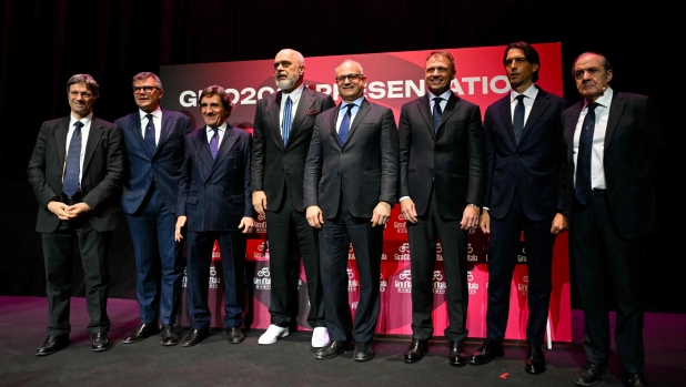 Albania's President Edi Rama (4thL), RCS Media group owner Urbano Cairo (3rdL), and Rome's Mayor Roberto Gualtieri (4thR), Italy's Minister of Agriculture, Francesco Lollobrigida attend the presentation of the official route of the Giro d?Italia and Giro d?Italia Women 2025 (Tour of Italy) cycling races, in Rome on January 13, 2025. (Photo by Andreas SOLARO / AFP)