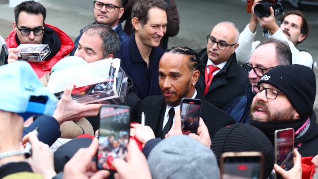 FIORANO MODENESE, ITALY - JANUARY 20: Sir Lewis Hamilton greets fans during his first official days as a Scuderia Ferrari F1 driver at Fiorano Circuit on January 20, 2025 in Fiorano Modenese, Italy. (Photo by Clive Rose/Getty Images) *** BESTPIX ***