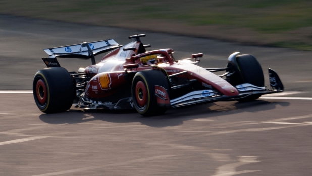 British driver Lewis Hamilton steers the new F1 Ferrari SF-25 during tests at Fiorano Circuit on February 19, 2025 in Fiorano Modenese near Maranello. (Photo by Federico SCOPPA / AFP)