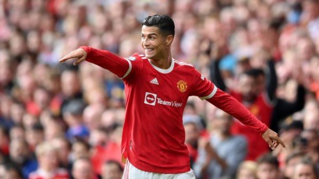 Cristiano Ronaldo esulta per un gol nella partita d'esordio con il Manchester United, Getty Images