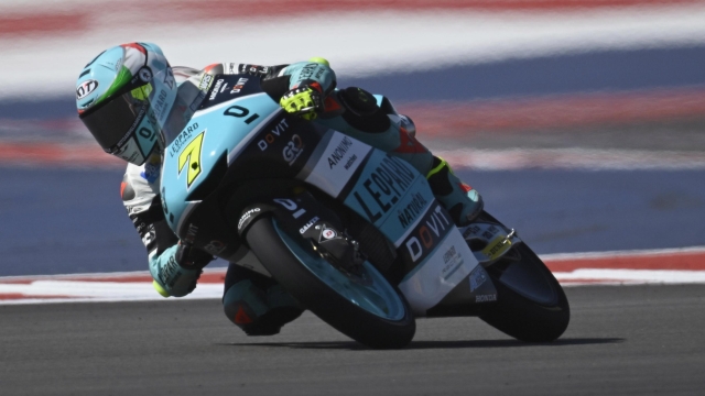 AUSTIN, TEXAS - APRIL 09: Denis Foggia of Italy and Leopard Racing rounds the bend during the Moto3 qualifying practice during the MotoGP Of The Americas - Qualifying on April 09, 2022 in Austin, Texas.   Mirco Lazzari gp/Getty Images/AFP == FOR NEWSPAPERS, INTERNET, TELCOS & TELEVISION USE ONLY ==