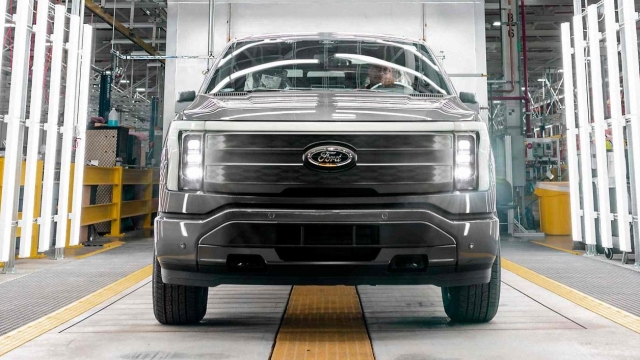 This handout photo released by Ford Motor Company on April 26, 2022 shows the F-150 Lightning at the Rouge Electric Vehicle Center in Dearborne, Michighan. - Today marks the launch of the all-new, electric F-150 Lightning pickup  a milestone moment in Americas shift to electric vehicles. (Photo by Steve KOSS / FORD MOTOR COMPANY / AFP) / RESTRICTED TO EDITORIAL USE - MANDATORY CREDIT "AFP PHOTO / FORD Motor Company / Steve KOSS / HANDOUT " - NO MARKETING - NO ADVERTISING CAMPAIGNS - DISTRIBUTED AS A SERVICE TO CLIENTS