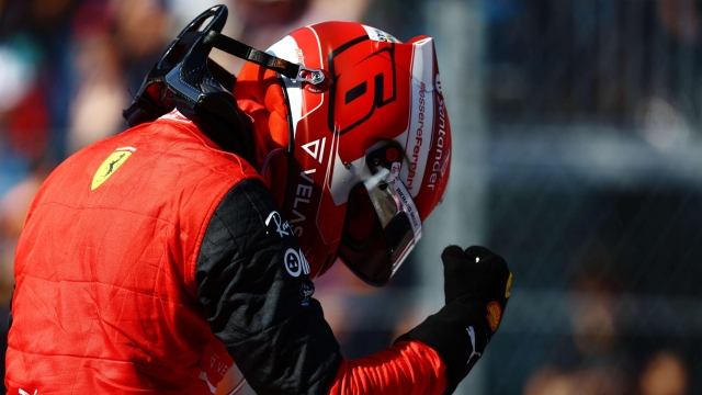 MIAMI, FLORIDA - MAY 07: Pole position qualifier Charles Leclerc of Monaco and Ferrari celebrates in parc ferme during qualifying ahead of the F1 Grand Prix of Miami at the Miami International Autodrome on May 07, 2022 in Miami, Florida.   Mark Thompson/Getty Images/AFP == FOR NEWSPAPERS, INTERNET, TELCOS & TELEVISION USE ONLY ==