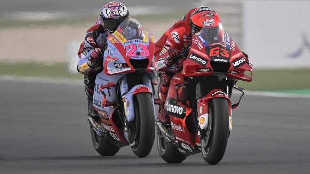 DOHA, QATAR - MARCH 05: Francesco Bagnaia of Italy and Ducati Lenovo Team leads Enea Bastianini of Italy and Gresini Racing MotoGP  during the MotoGP of Qatar - Qualifying at Losail Circuit on March 05, 2022 in Doha, Qatar. (Photo by Mirco Lazzari gp/Getty Images,)
