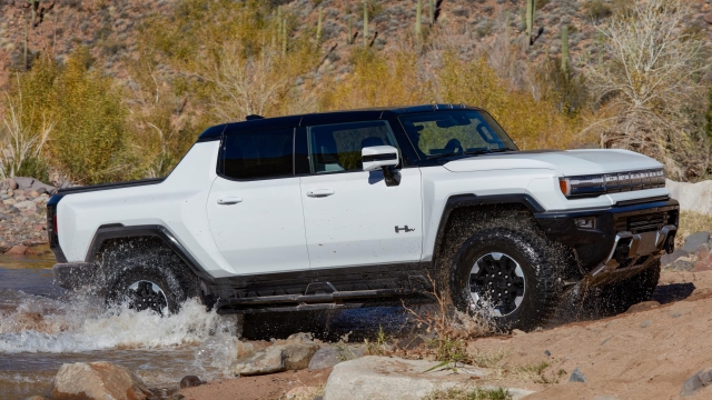 After playing in the elements, the 2022 GMC HUMMER EV Pickups’ UltraVision cameras feature a wash function to help remove debris for clear views on the underbody cameras.