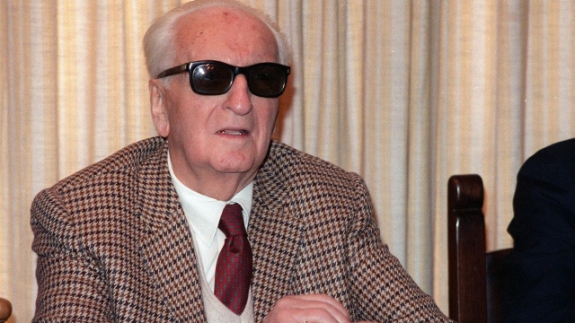 portrait of Enzo Ferrari dated 17 March 1987 in Maranello during a press conference. Enzo Ferrari died 14 August 1988. (Photo by DANIEL JANIN / AFP)