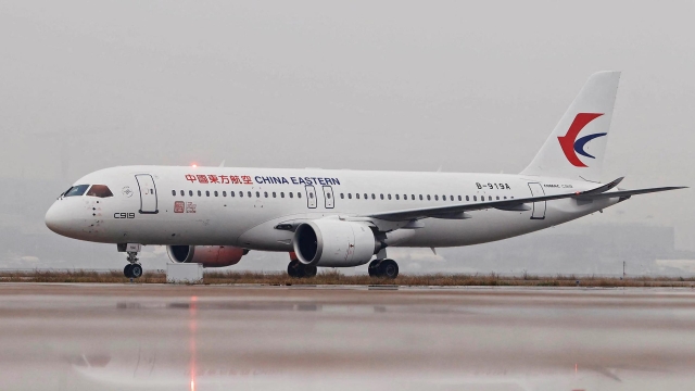 A Commercial Aircraft Corp of China (COMAC) C919 aircraft, China's first domestically produced large passenger jet, lands at Hongqiao International Airport after it is formally handed over to China Eastern Airlines in Shanghai on December 9, 2022. (Photo by AFP) / China OUT