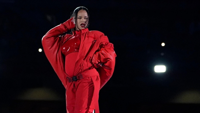 TOPSHOT - Barbadian singer Rihanna performs during the halftime show of Super Bowl LVII between the Kansas City Chiefs and the Philadelphia Eagles at State Farm Stadium in Glendale, Arizona, on February 12, 2023. (Photo by TIMOTHY A. CLARY / AFP)