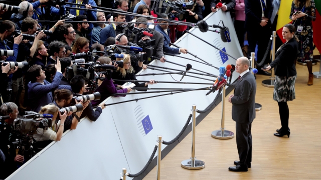 Germany's Chancellor Olaf Scholz speaks with the media as he arrives for an EU summit at the European Council building in Brussels, Thursday, March 23, 2023. European Union leaders meet Thursday for a two-day summit to discuss the latest developments in Ukraine, the economy, energy and other topics including migration. (AP Photo/Olivier Matthys)