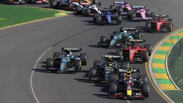 Cars turn through the first corner during the start of the Australian Formula One Grand Prix at Albert Park in Melbourne, Sunday, April 2, 2023. (AP Photo/Asanka Brendon Ratnayake)