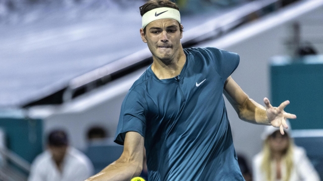 epa10551593 Taylor Fritz of USA in action against Carlos Alcaraz of Spain during the Menâ??s Singles Quarterfinals of the 2023 Miami Open tennis tournament at the Hard Rock Stadium in Miami, Florida, USA, 30 March 2023.  EPA/CRISTOBAL HERRERA-ULASHKEVICH