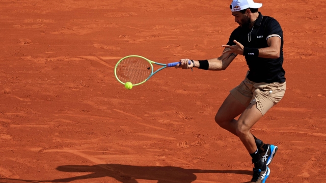 Italy's Matteo Berrettini plays a forehand return to US' Maxime Cressy during their Monte-Carlo ATP Masters Series tournament round of 64 tennis match in Monaco on April 10, 2023. (Photo by Valery HACHE / AFP)