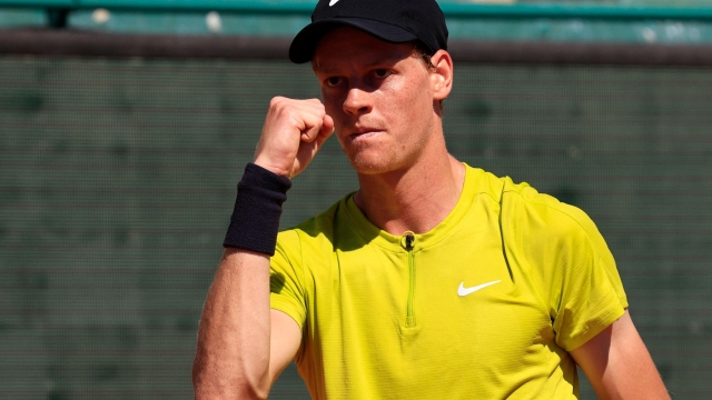 Italy's Jannik Sinner gestures during the Monte Carlo ATP Masters Series Tournament round of 16 tennis match against Poland's Hubert Hurkacz at Monte Carlo on April 13, 2023. (Photo by Valery HACHE / AFP)