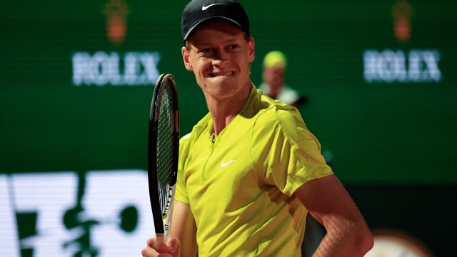 Italy's Jannik Sinner reacts during their Monte-Carlo ATP Masters Series tournament semi-final tennis match against Denmark's Holger Rune in Monte Carlo on April 15, 2023. (Photo by Valery HACHE / AFP)