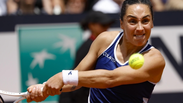 Martina Trevisan of Italy in action during her woman's singles second round match against Karolina Muchova of Czech Republic (not pictured) at the Italian Open tennis tournament in Rome, Italy, 12 May 2023. ANSA/FABIO FRUSTACI