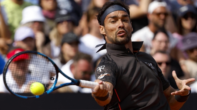 Fabio Fognini of Italy in action during his men's singles second round match against Miomir Kecmanovic from Serbia (not pictured) at the Italian Open tennis tournament in Rome, Italy, 12 May 2023. ANSA/FABIO FRUSTACI