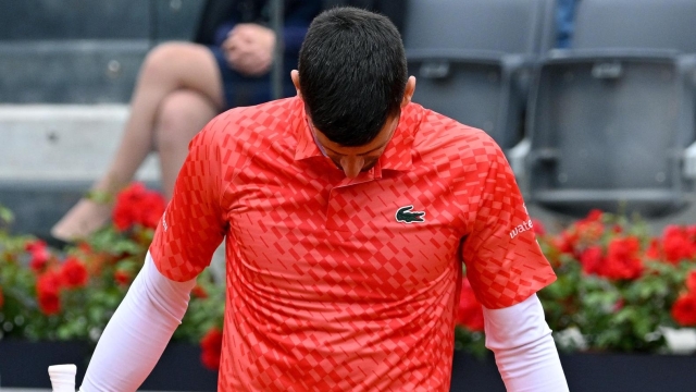 Novak Djokovic of Serbia reacts during his men's quarter final round match against Holger Rune of Denmark (not pictured) at the Italian Open tennis tournament in Rome, Italy, 17 May 2023.  ANSA/ETTORE FERRARI