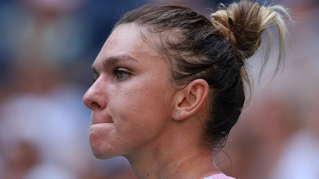 NEW YORK, NEW YORK - AUGUST 29: Simona Halep of Romania reacts against Daria Snigur of Ukraine during the Women's Singles First Round on Day One of the 2022 US Open at USTA Billie Jean King National Tennis Center on August 29, 2022 in the Flushing neighborhood of the Queens borough of New York City.   Julian Finney/Getty Images/AFP == FOR NEWSPAPERS, INTERNET, TELCOS & TELEVISION USE ONLY ==