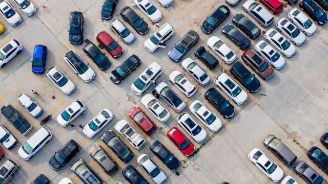 This aeiral photo taken on May 17, 2023 shows cars parked at a second-hand car market in Zhengzhou, in China's central Henan province. (Photo by AFP) / China OUT