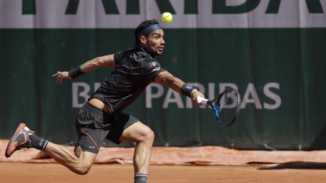 Italy's Fabio Fognini plays a shot against Australia's Jason Kubler during their second round match of the French Open tennis tournament at the Roland Garros stadium in Paris, Wednesday, May 31, 2023. (AP Photo/Jean-Francois Badias)