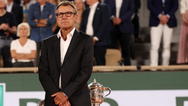 PARIS, FRANCE - JUNE 04:  Gilles Moretton French Tennis Federation President and Mats Wilander look on from the presentation ceremony after Iga Swiatek of Poland wins against Coco Gauff of The United States during the Women?s Singles final match on Day 14 of The 2022 French Open at Roland Garros on June 04, 2022 in Paris, France. (Photo by Clive Brunskill/Getty Images)