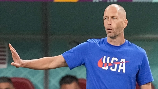 FILE - U.S. coach Gregg Berhalter gestures during the team's World Cup round of 16 soccer match against the Netherlands at Khalifa International Stadium in Doha, Qatar, Dec. 3, 2022. Berhalter has agreed to return as U.S. coach after being cleared in a domestic violence investigation, a person familiar with the decision told The Associated Press. The person spoke on condition of anonymity Thursday night, June 15, because an announcement had not been made. (AP Photo/Ebrahim Noroozi, File)