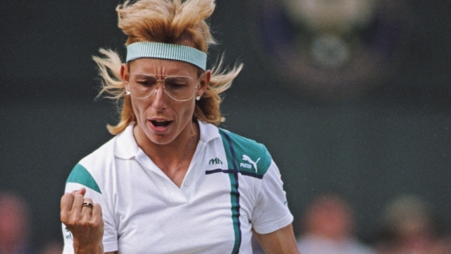 Martina Navratilova of the United States pumps her fist during her Women's Singles Final match against Steffi Graf at the Wimbledon Lawn Tennis Championship on 3 July 1988 at the All England Lawn Tennis and Croquet Club in Wimbledon in London, England. (Photo by Bob Martin/Getty Images)