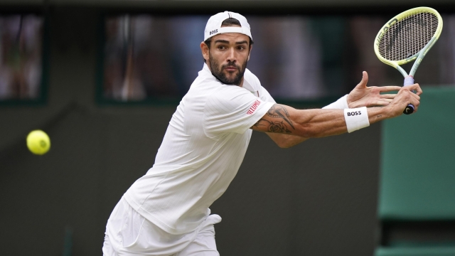 Italy's Matteo Berrettini plays a return to Germany's Alexander Zverev during the men's singles match on day six of the Wimbledon tennis championships in London, Saturday, July 8, 2023. (AP Photo/Alberto Pezzali)