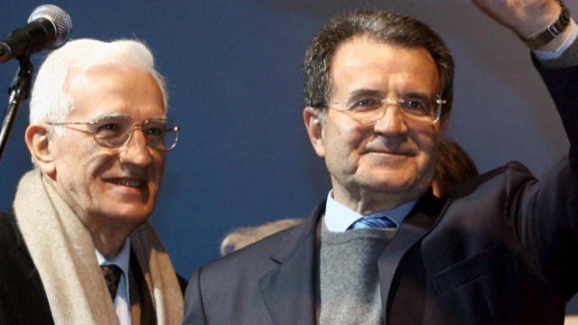 Leader of centreleft The Union coalition Romano Prodi is flanked by his brother Vittorio during a victory rally in his home city of Bologna late Wednesday 12 April 2006. Prodi condemned outgoing Prime Minister Silvio Berlusconi's efforts to overturn the results of the 9-10 April elections, the closest in modern Italian history, and warned that the premier was stoking dangerous political tensions. 'We have won ... Berlusconi has to go,' said Prodi, former president of the European Commission, whose victory has been acknowledged by France, Spain, Luxembourg and the European Commission but not Washington. According to Interior Ministry data, the centre-left won the election for the lower house of parliament by just 25,000 votes out of 38.1 million ballots cast. ANSA/GIORGIO BENVENUTI