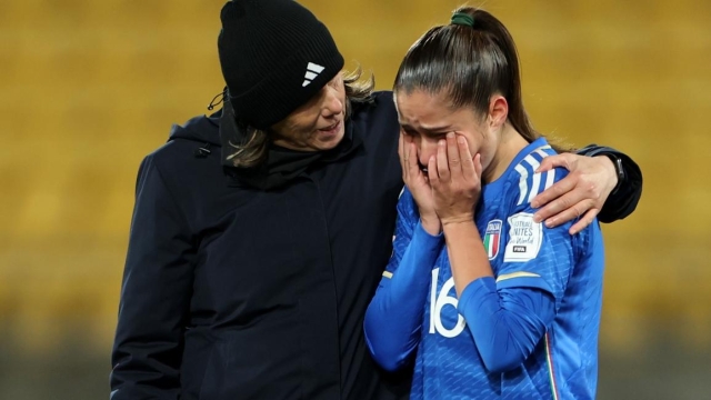 WELLINGTON, NEW ZEALAND - AUGUST 02: Milena Bertolini, Head Coach of Italy, consoles Giulia Dragoni of Italy after the team's defeat and elimination from the tournament in the FIFA Women's World Cup Australia & New Zealand 2023 Group G match between South Africa and Italy at Wellington Regional Stadium on August 02, 2023 in Wellington, New Zealand. (Photo by Catherine Ivill/Getty Images)