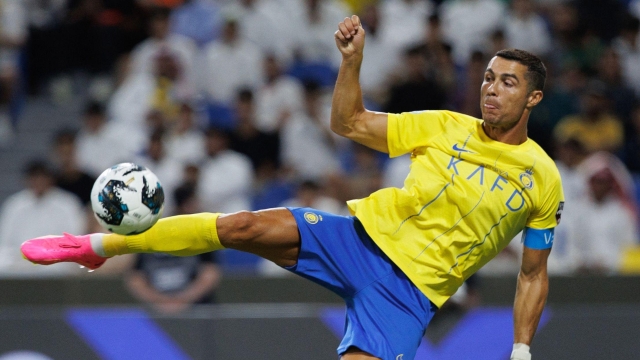 Nassr's Portuguese forward Cristiano Ronaldo kicks the ball during the 2023 Arab Club Champions Cup group C football match between Saudi Arabia's Al-Nassr and Saudi Arabia's Al-Shabab at the King Fahd Stadium in Taif on July 28, 2023. (Photo by AFP)
