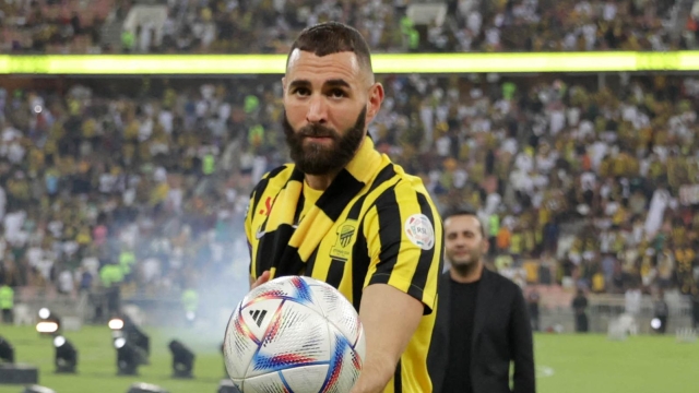 French forward Karim Benzema greets the crowd during his unveiling at King Abdullah Sports City stadium in Jeddah, on June 8, 2023. Benzema was unveiled as an Al-Ittihad player in front of thousands of fans in Saudi Arabia on June 8, a day after the oil-rich kingdom just failed to reel in Lionel Messi. (Photo by AFP)