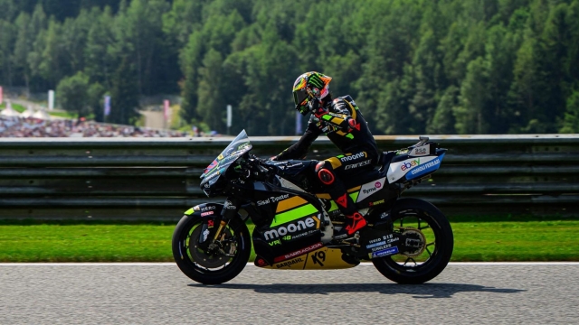 Mooney VR46 Racing Team Italian rider Marco Bezzecchi waves  at the end of the first practice session at the Red Bull Ring race track in Spielberg, Austria on August 18, 2023, ahead of the MotoGP Austrian Grand Prix. (Photo by Jure Makovec / AFP)