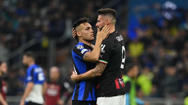 MILAN, ITALY - MAY 16:  Olivier Giroud of AC Milan reacts with Lautaro Martinez of FC Internazionale at the end of the UEFA Champions League semi-final second leg match between FC Internazionale and AC Milan at Stadio Giuseppe Meazza on May 16, 2023 in Milan, Italy. (Photo by Claudio Villa/AC Milan via Getty Images)