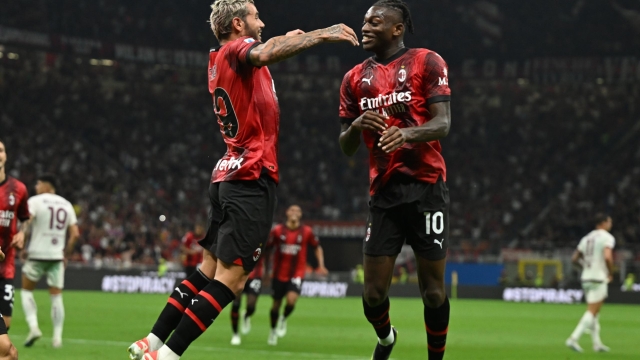 MILAN, ITALY - AUGUST 26:  Theo Hernandez of AC Milan celebrates with Rafael Leao after scoring the goal during the Serie A TIM match between AC Milan and Torino FC at Stadio Giuseppe Meazza on August 26, 2023 in Milan, Italy. (Photo by Claudio Villa/AC Milan via Getty Images)