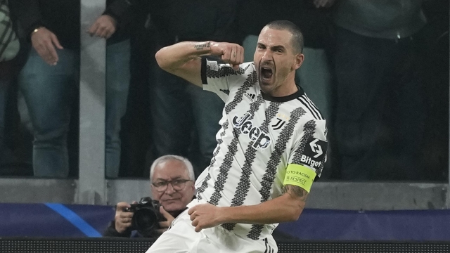 FILE - Juventus' Leonardo Bonucci celebrates after scoring his side's opening goal during the Champions League group H soccer match between Juventus and Paris Saint Germain at the Allianz stadium in Turin, Italy, Wednesday, Nov. 2, 2022. Italy captain Leonardo Bonucci?s potential move to Union Berlin and Bayern Munich?s search for a defensive midfielder are among the outstanding matters to be cleared up on the final day of the transfer window in Germany.  (AP Photo/Antonio Calanni, File)