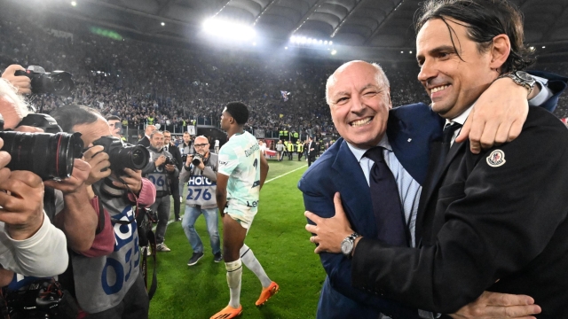 Inter's coach Simone Inzaghi (R) and CEO Giuseppe Marotta celebrate after winning the Coppa Italia Final soccer match against ACF Fiorentina at the Olimpico stadium in Rome, Italy, 24 May 2023. ANSA/CLAUDIO PERI