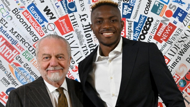 Napoli's president Aurelio De Laurentiis (L) and Napoli's Nigerian forward Victor Osimhen prior to be awarded as 'Best Foreign Athlete of the Year' by Italian foreign press association in Rome, Italy, 06 March 2023.  ANSA/ETTORE FERRARI