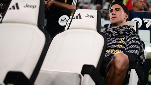 Juventus Serbian forward Dusan Vlahovic sits on the bench during the Italian Serie A football match Juventus vs Lecce on September 26, 2023, at the Allianz Stadium in Turin. (Photo by MARCO BERTORELLO / AFP)
