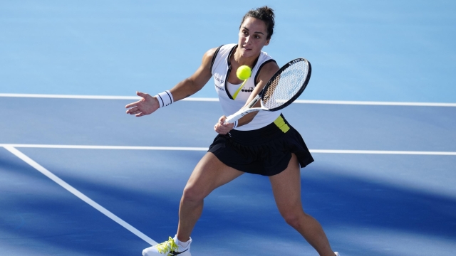 BEIJING, CHINA - SEPTEMBER 30: Martina Trevisan of Italy in action against Tatjana Maria of Germany during day 5 of the 2023 China Open at National Tennis Center on September 30, 2023 in Beijing, China. (Photo by Fred Lee/Getty Images)
