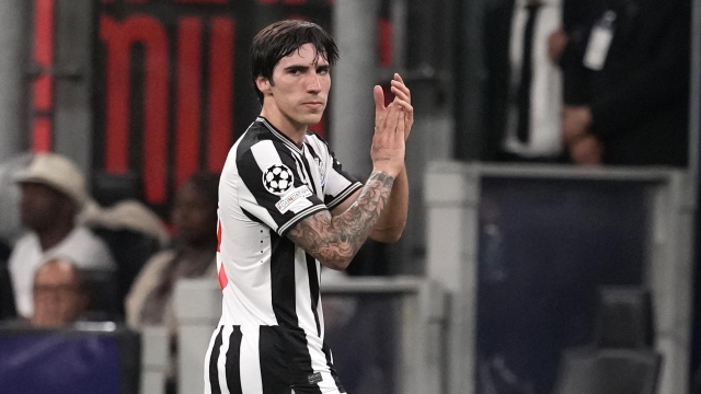 Newcastle's Sandro Tonali applauds as he leaves the pitch during the Champions League group F soccer match between AC Milan and Newcastle at the San Siro stadium in Milan, Italy, Tuesday, Sept. 19, 2023. (AP Photo/Antonio Calanni)