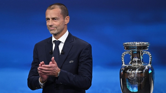 UEFA president Aleksander Ceferin announces the names of UK and Ireland being elected to host the Euro 2028 fooball tournament during the announcement ceremony at the UEFA headquarters in Nyon on October 10, 2023. (Photo by Fabrice COFFRINI / AFP)