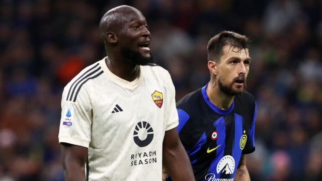 MILAN, ITALY - OCTOBER 29: Romelu Lukaku of AS Roma looks on with Francesco Acerbi of FC Internazionale during the Serie A TIM match between FC Internazionale and AS Roma at Stadio Giuseppe Meazza on October 29, 2023 in Milan, Italy. (Photo by Marco Luzzani/Getty Images)