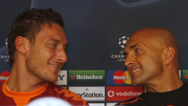 Roma's Francesco Totti, left, and his coach Luciano Spalletti are seen during a media conference, ahead of their Champions League group A soccer match against Roma on Wednesday, in London, Tuesday, Oct. 21, 2008. (AP Photo/Kirsty Wigglesworth)